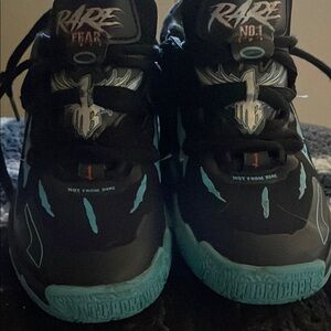 Puma Black and Blue Sneakers with Dynamic Design